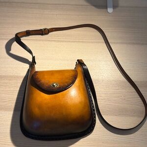 Beautiful leather crossbody bag with one inner compartment